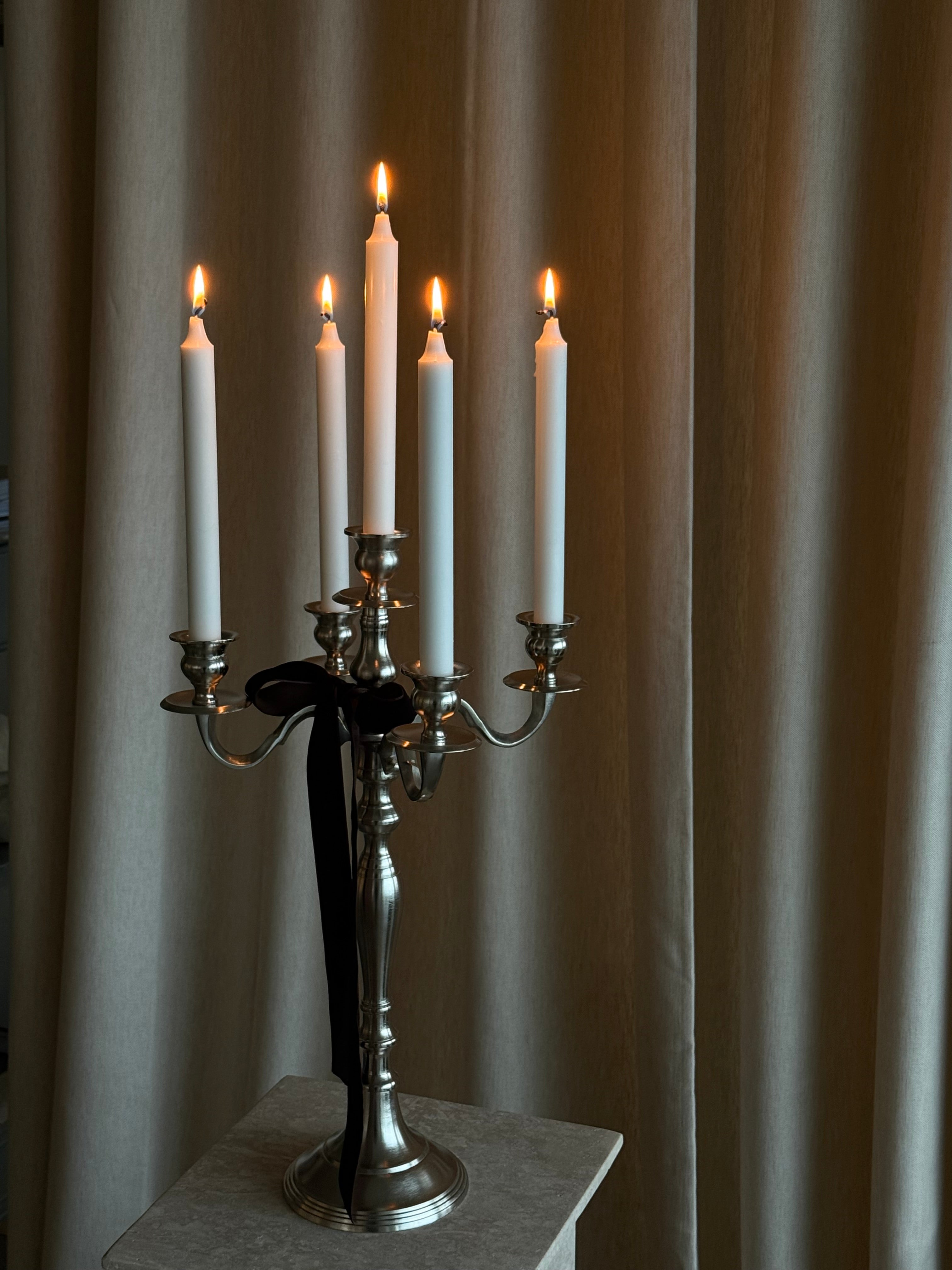 Femarmet lysestake høy