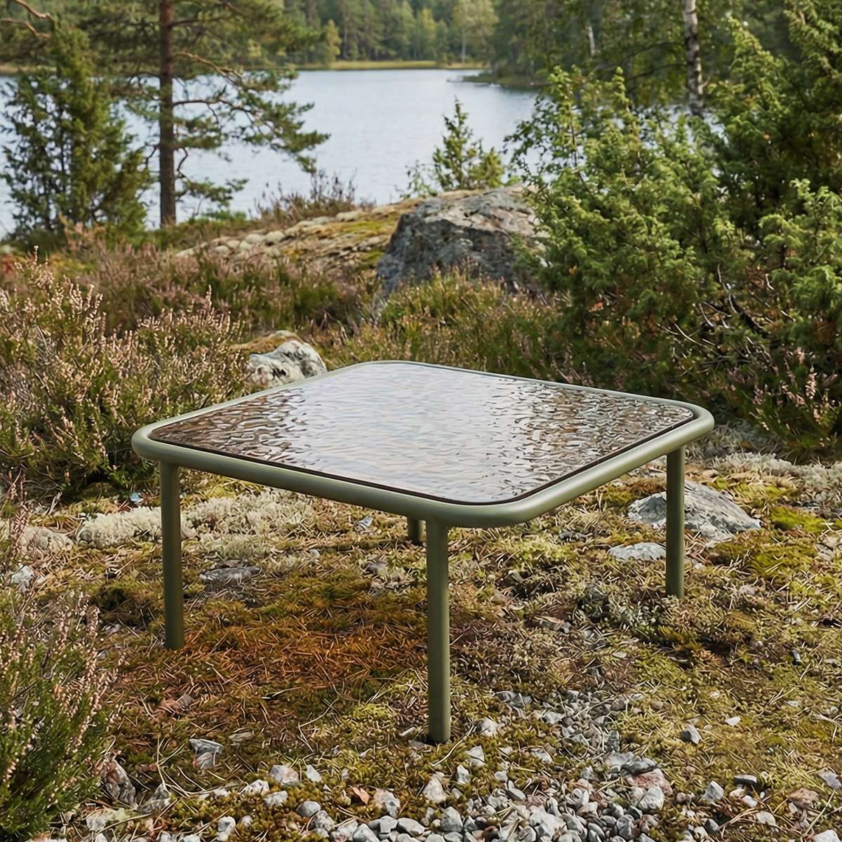 Mollis hagebord olive nærbilde – pulverlakkert aluminiumsoverflate i dempet oliventone med tydelig konstruksjonsdetalj