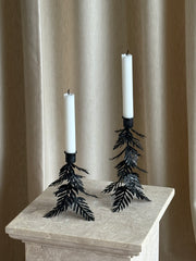 Tre lysestake svart høy